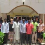 Stakeholders pose at a cattle breeding seminar in July of 2016