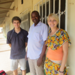 Project Managers Corey Spies (left) and Brianna Parsons (right) meet with Ousmain Ceesay, one of The Gambia's three government veterinarians